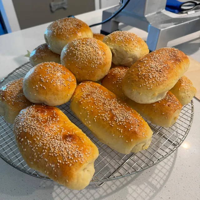 Fresh bagels cooling on a rack
